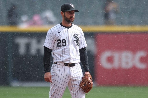 Chicago White Sox shortstop Paul DeJong (29) waits for the pitch in the rain during the seventh inning of the game against the Atlanta Braves at Guaranteed Rate Field in Chicago on April 1, 2024. (Eileen T. Meslar/Chicago Tribune)
