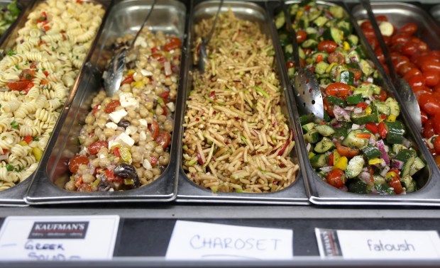 Charoset, center, is one of the specialty items prepared and sold at Kaufman's Bagel & Delicatessen during Passover. (Stacey Wescott/Chicago Tribune)