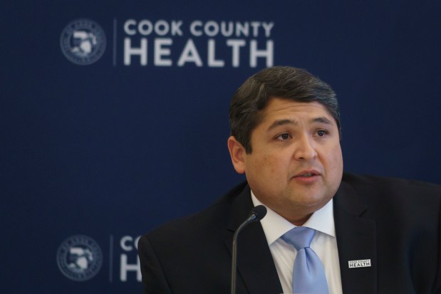 Then-Cook County Health CEO Israel Rocha speaks during a meeting with Cook County officials to discuss a COVID-19 vaccine distribution plan on Dec. 14, 2020. (Youngrae Kim / Chicago Tribune)