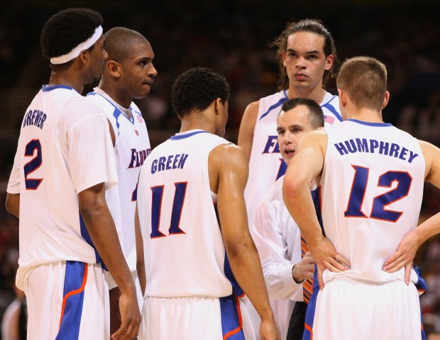 Florida coach Billy Donovan talks to starters, from left, Corey Brewer, Al Horford, Taurean Green, Joakim Noah and Lee Humphrey in the final minutes of a 65-57 win over Butler in the NCAA Tournament on March 23, 2007, in St. Louis. (Gary W Green/Orlando Sentinel)