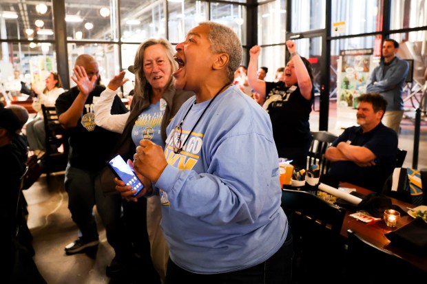 Vada Woods celebrates after Kamilla Cardoso was picked third in the draft by the Chicago Sky during Chicago Sky's WNBA draft watch party at Revolution Brewing in Chicago on April 15, 2024. (Eileen T. Meslar/Chicago Tribune)