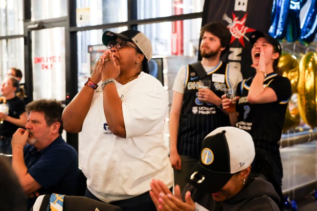 Nancy Thompson celebrates after Kamilla Cardoso was picked third in the draft by the Chicago Sky during Chicago Sky's WNBA draft watch party at Revolution Brewing in Chicago on April 15, 2024. (Eileen T. Meslar/Chicago Tribune)