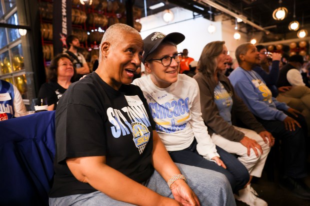 Denise Coleman, left, and Michele Curley wait in anticipation for the Chicago Sky's second pick, seventh overall, during Chicago Sky's WNBA draft watch party at Revolution Brewing in Chicago on April 15, 2024. (Eileen T. Meslar/Chicago Tribune)