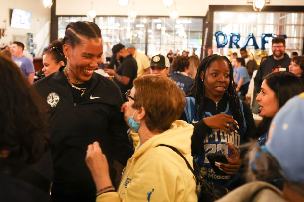 Chicago Sky Coach Tamera "Ty" Young speaks to a fan during Chicago Sky's WNBA draft watch party at Revolution Brewing in Chicago on April 15, 2024. (Eileen T. Meslar/Chicago Tribune)