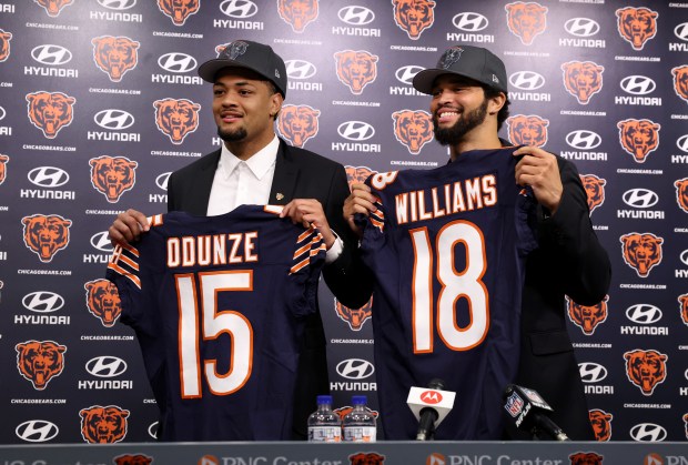New Chicago Bears wide receiver Rome Odunze and new quarterback Caleb Williams pose for photographs at Halas Hall in Lake Forest on Friday, April 26, 2024. Odunze was drafted number nine overall out of Washington and Williams was drafted number one overall out of USC in the 2024 NFL Draft. (Chris Sweda/Chicago Tribune)