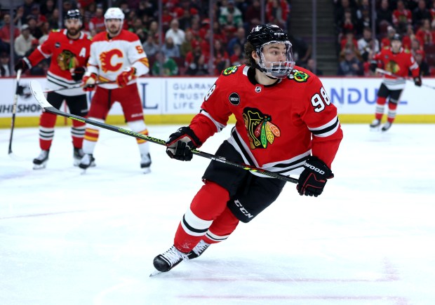 Blackhawks center Connor Bedard skates down the ice against the Flames on March 26, 2024, at the United Center. (Chris Sweda/Chicago Tribune)