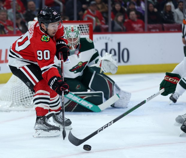 Chicago Blackhawks center Tyler Johnson (90) makes a pass in the first period of a game against the Minnesota Wild at the United Center in Chicago on Feb. 7, 2024. (Chris Sweda/Chicago Tribune)