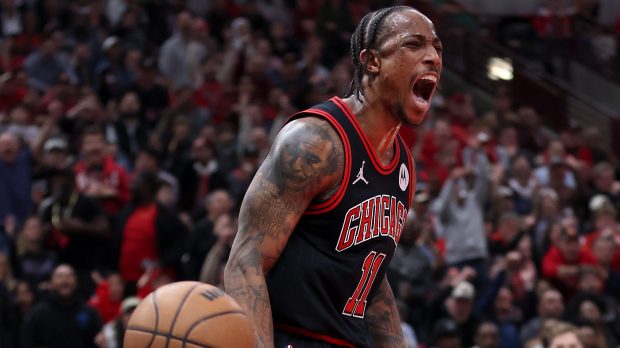 Bulls forward DeMar DeRozan screams after a dunk in the first half of a play-in tournament game against the Hawks on April 17, 2024, at the United Center. (Chris Sweda/Chicago Tribune)