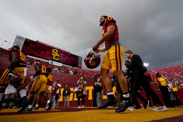 Southern California quarterback Caleb Williams makes his way off the field after warmup up before an NCAA college football game against UCLA in Los Angeles, Nov. 18, 2023. (Ashley Landis/AP)