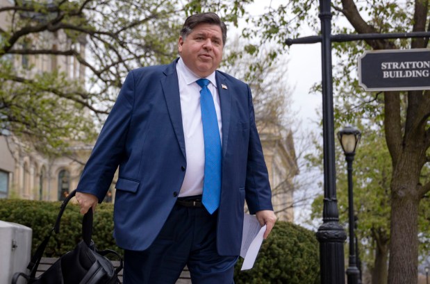 Gov. J.B. Pritzker departs the Illinois State Capitol complex in Springfield on April 10, 2024. (Brian Cassella/Chicago Tribune)