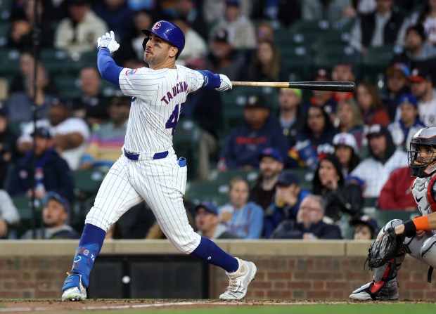Cubs right fielder Mike Tauchman hits a three-run home run in the first inning against the Astros on April 23, 2024, at Wrigley Field. (Chris Sweda/Chicago Tribune)