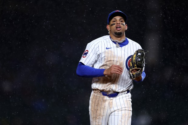 Chicago Cubs third baseman Christopher Morel (5) runs in from the infield after the top of the sixth inning of a game against the Colorado Rockies at Wrigley Field in Chicago on Wednesday, April 3, 2024. (Chris Sweda/Chicago Tribune)