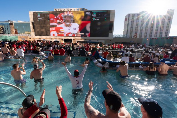 Fans watch the Super Bowl 58 NFL football game from a pool on top of the Circa Resort and Casino, Feb. 11, 2024, in Las Vegas. (Gregory Bull/AP)