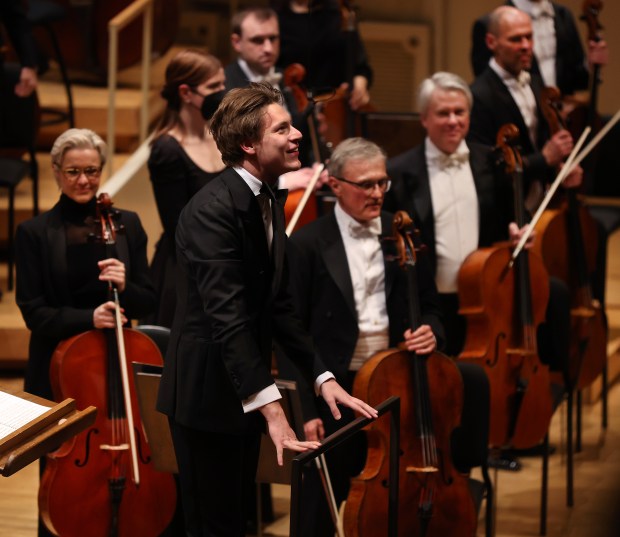 New Chicago Symphony Orchestra music director designate Klaus Mäkelä takes a bow in front of the CSO at Symphony Center on April 4, 2024. (Chris Sweda/Chicago Tribune)