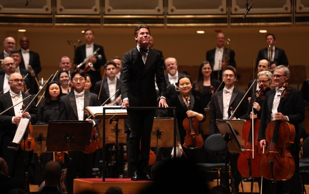 New Chicago Symphony Orchestra music director designate Klaus Mäkelä receives applause from the crowd as he takes a bow prior to conducting the CSO at Symphony Center on April 4, 2024. (Chris Sweda/Chicago Tribune)