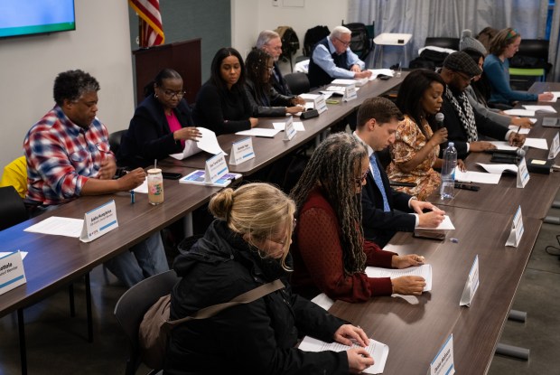 The nominating committee, composed of one representative from the 22 police district councils, votes to nominate candidates for the first-ever permanent Commission for Public Safety and Accountability that will be forwarded to the mayor, during a meeting at UCAN Chicago, March 8, 2024. (E. Jason Wambsgans/Chicago Tribune)