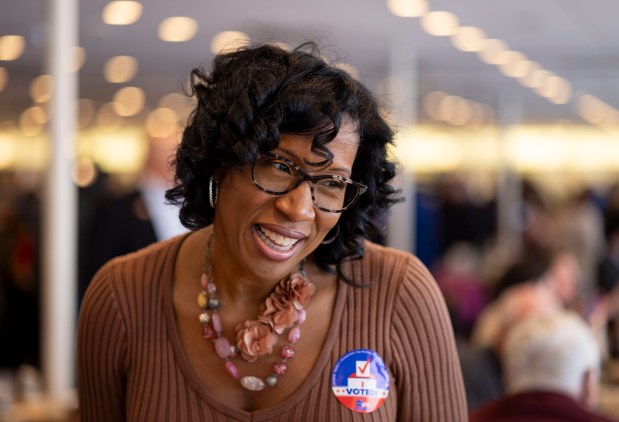 City Treasurer Melissa Conyears-Ervin greets people on primary Election Day on Tuesday, March 19, 2024, at Manny's Cafeteria & Delicatessen in the South Loop. (Brian Cassella/Chicago Tribune)