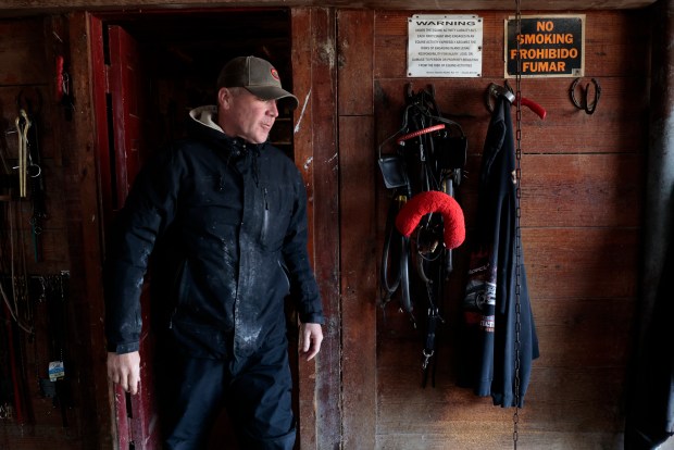 Harness driver and trainer Casey Leonard at Leonard Stables in Harvard on March 5, 2024, Harness racing owners, trainers and drivers are pushing for state lawmakers to take away Hawthorne race track's veto power over new racinos in the Chicago area. (Antonio Perez/Chicago Tribune)