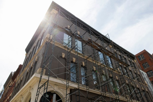 The three-and-a-half story brick and cast-iron building at 720 N. Wells Street, which rose from the ashes of the Chicago Fire in 1872 with the seventh permit issued during the city's rebuilding, on Wednesday, April 10, 2024, in Chicago. (Vincent Alban/Chicago Tribune)