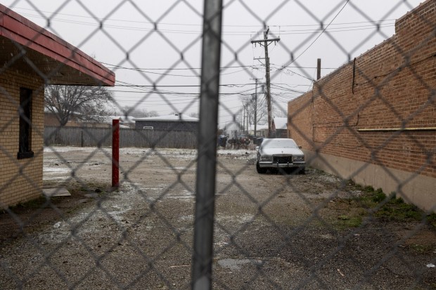 The vacant lot behind the storefront that Charles Perry recently purchased, March 22, 2024, on 95th St. in Chicago. (Vincent Alban/Chicago Tribune)