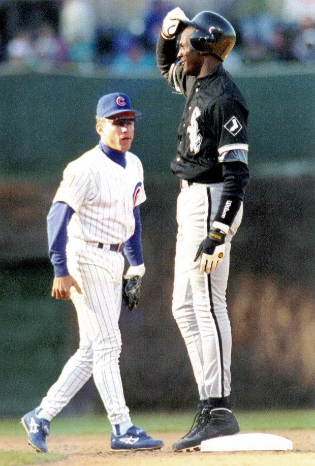 Michael Jordan tips his hat after hitting a double in driving in one of his two runs Thursday during the Windy City Classic game against the Cubs at Wrigley Field on April 7, 1994. (Val Mazzenga/Tribune photo)