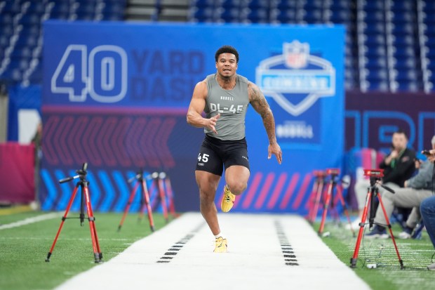 Chop Robinson runs the 40-yard dash at the NFL combine on Feb. 29, 2024, in Indianapolis. (AP Photo/Michael Conroy)