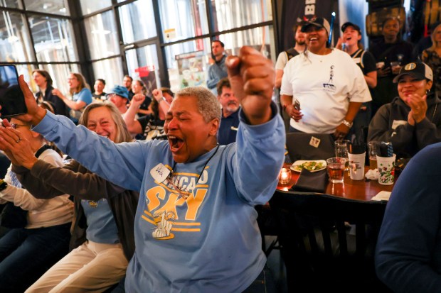 Vada Woods celebrates after Kamilla Cardoso was picked third in the draft by the Chicago Sky during Chicago Sky's WNBA draft watch party at Revolution Brewing in Chicago on April 15, 2024. (Eileen T. Meslar/Chicago Tribune)