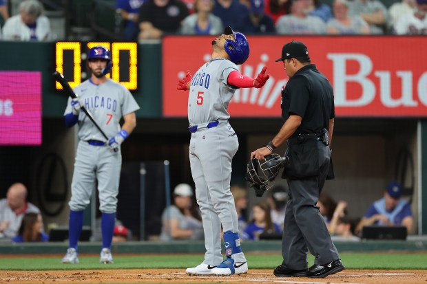 ARLINGTON, TEXAS - MARCH 31: Christopher Morel #5 of the Chicago Cubs celebrates a three run home run against the Texas Rangers during the first inning at Globe Life Field on March 31, 2024 in Arlington, Texas. (Photo by Stacy Revere/Getty Images)