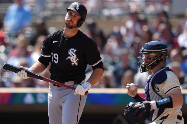 White Sox shortstop Paul DeJong walks back to the dugout after striking out during the second inning against the Twins on Thursday, April 25, 2024, in Minneapolis. (Abbie Parr/AP)