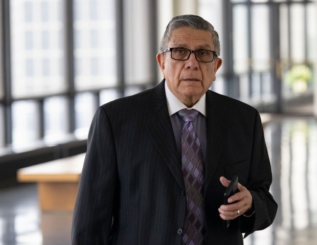 Dr. Fabio Ortega walks outside a courtroom at the Daley Center on March 22, 2023. (Brian Cassella/Chicago Tribune)