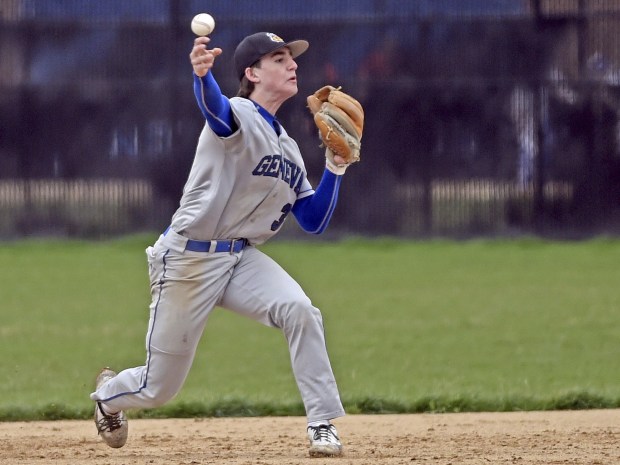 Geneva's Nate Stempowski throws out a runner at first base against St. Charles North during a DuKane Conference in St. Charles on Monday, April 25, 2022.