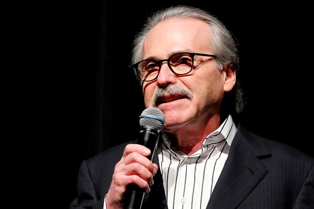 David Pecker, Chairman and CEO of American Media, addresses those attending the Shape & Men's Fitness Super Bowl Party in New York, on Jan. 31, 2014.