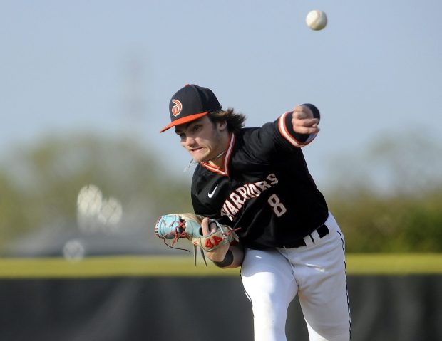 Lincoln-Way West'st Conor Essenburg (8) delivers a pitch against Lincoln-Way East during a SouthWest Suburban Conference crossover in Frankfort on Monday, April 24, 2023.