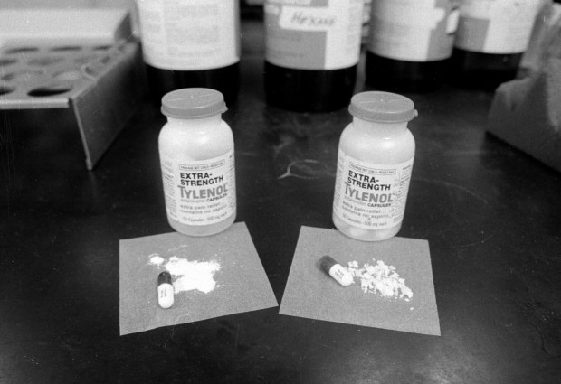 These Tylenol capsules were connected with one of the 1982 poisonings. Cook County doctors found that the capsule at right contained cyanide, which has a grainier texture than the medicine shown at left. (Charles Osgood/Chicago Tribune)