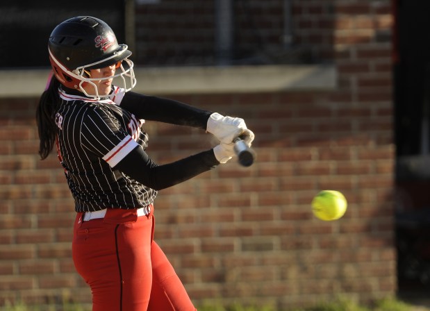 Benet's Alaina Rosner (7) connects against Carmel during an East Suburban Catholic Conference game Wednesday, April 24, 2024 in Lisle, IL. (Steve Johnston/Naperville Sun)