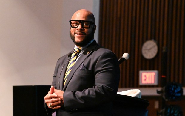 Allen J. Bryson, keynote speaker, makes an appearance in the Edward H. Gilbert Theater at the Black Teen Empowerment Summit on April 19, 2024 at Rolling Meadows High School in Rolling Meadows. (Karie Angell Luc/Pioneer Press)