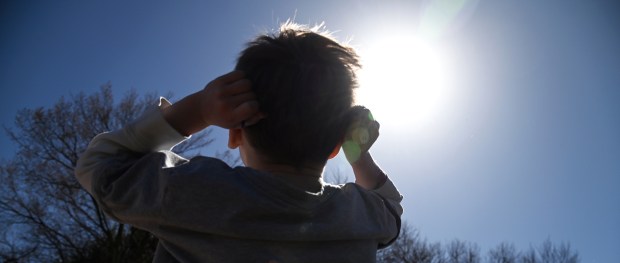 Viewing a solar eclipse at Greenbriar School in Northbrook on April 8, 2024. (Karie Angell Luc/for the Pioneer Press)