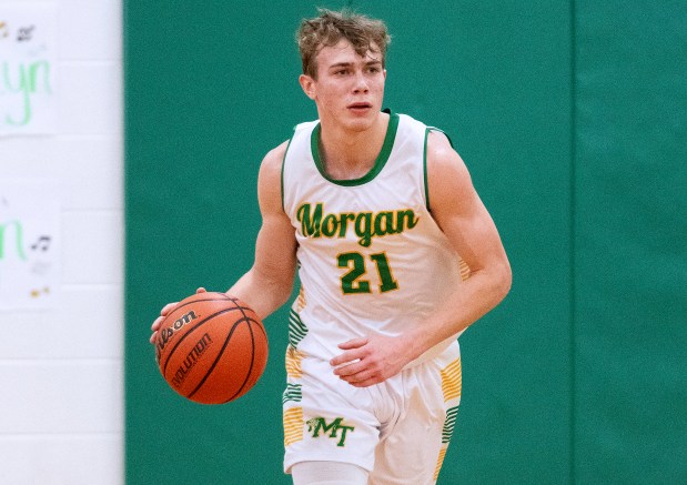 Morgan Township's Keagen Holder moves the ball during a home game against Westville on Friday, Feb. 16, 2024. (Michael Gard/Post-Tribune)