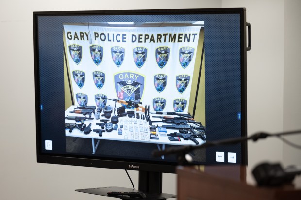 A monitor displaying the results of a recent firearm bust is seen during a news conference at the Gary Police Department on Wednesday, April 3, 2024. (Kyle Telechan/for the Post-Tribune)