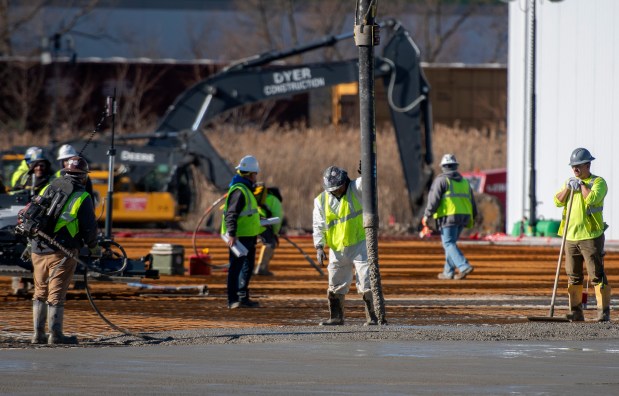 Crews pour the foundation for a cold-storage facility in Hobart on Saturday, April 6, 2024. (Michael Gard/for the Post-Tribune)