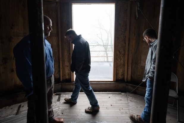 Visitors walk around the top floor of the Century of Progress "House of Tomorrow" in Beverly Shores during a tour of the house, which is slated for renovation, on Thursday, April 11, 2024. (Kyle Telechan/for the Post-Tribune)