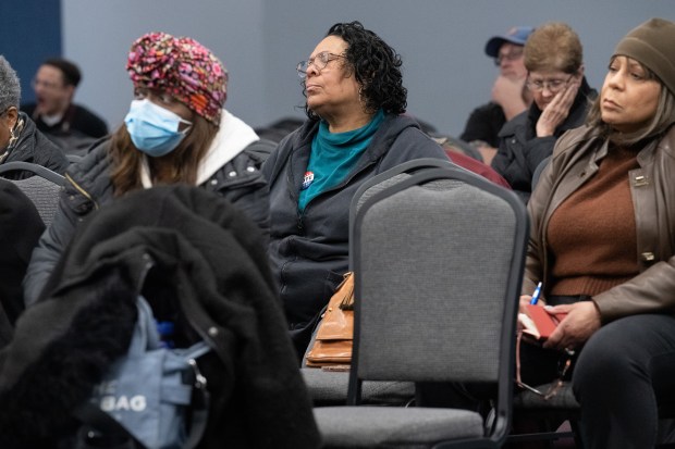 Audience members listen during a debate between State Senator Dave Vinzant, D-Hobart, and Gary City Councilman Mark Spencer on Thursday, April 4, 2024. (Kyle Telechan/for the Post-Tribune)