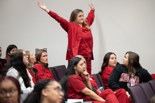 Indiana University School of Nursing students react during a game of medical Jeopardy between rounds of the school's annual SIM Wars on Thursday, April 25, 2024. (Kyle Telechan/for the Post-Tribune)