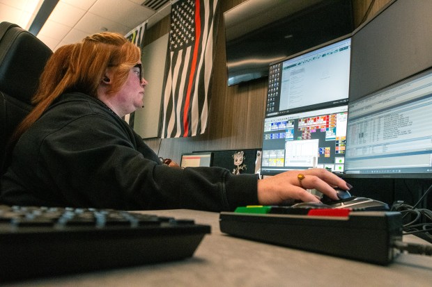 Telecommunicator Maria Kalizae works a call during her shift at the Porter County Central Communications office in Valparaiso Friday, April 12, 2024. Kalizae, of Lake Village, Indiana, has been working at the office for approximately a year. (Andy Lavalley for the Post-Tribune)