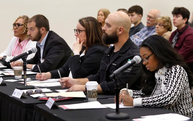 Judges (l to r) Emily Edwards, Curt Bowers, Anne Marie Murphy, Wade Brietzke and Kristin Burton listen to the presenters during the Innovate WithIN Region 4 Finals, hosted on the campus of Purdue Northwest along with the Society of Innovators on Friday, April 19, 2024. (John Smierciak/for the Post-Tribune)