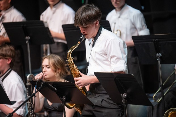 Hebron High School Jazz Ensemble saxophonist Aiden Reinboldt performs a solo as his school performs in the Valparaiso University Jazz Festival on Wednesday, April 17, 2024. (Kyle Telechan/for the Post-Tribune)