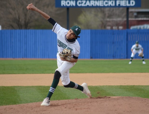 Evergreen Park's Michael Rodriguez throws a pitch against Reavis during a South Suburban Red game in Burbank on Friday, April 12, 2024. (Jeff Vorva / Daily Southtown)