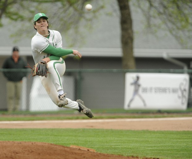 Providence's third baseman Bobby Kutt (34) charges in on a ground ball and makes the throw to first against Marist during a Do It Stevie's Way 2191st-round game Wednesday, April 17, 2024 in New Lenox, IL. (Steve Johnston/Daily Southtown)
