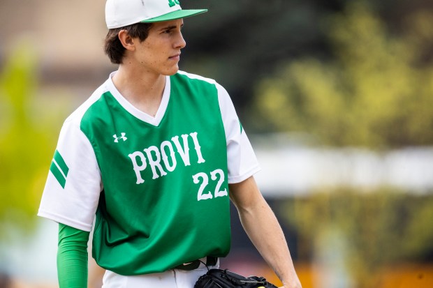 Providence's Kasten Goebbert looks to his catcher for the sign during a Catholic League Blue game against Brother Rice in Chicago on Saturday, April 27, 2024. (Vincent D. Johnson/for the Daily Southtown)