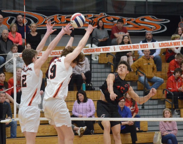 Lincoln-Way Central's Braeden Fawcett, right, goes on the attack against Lincoln-Way West in a Southwest Suburban Conference match in New Lenox on Tuesday, April 23, 2024. (Jeff Vorva / Daily Southtown)